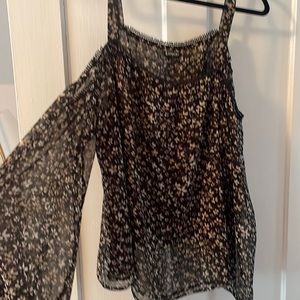 Express flowy light weight bubble sleeve shirt. Black with tan flowers. XL.